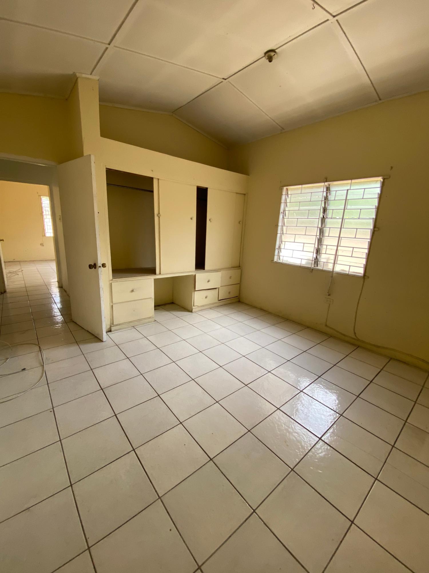 Fixer-Upper-5-Bedroom-House-for-Sale-in-Pembroke-Hall-St.-Andrew-Jamaica Ninth image of 103 Ken Hill Drive in Kingston 20, St. Andrew, Jamaica - property is For Sale