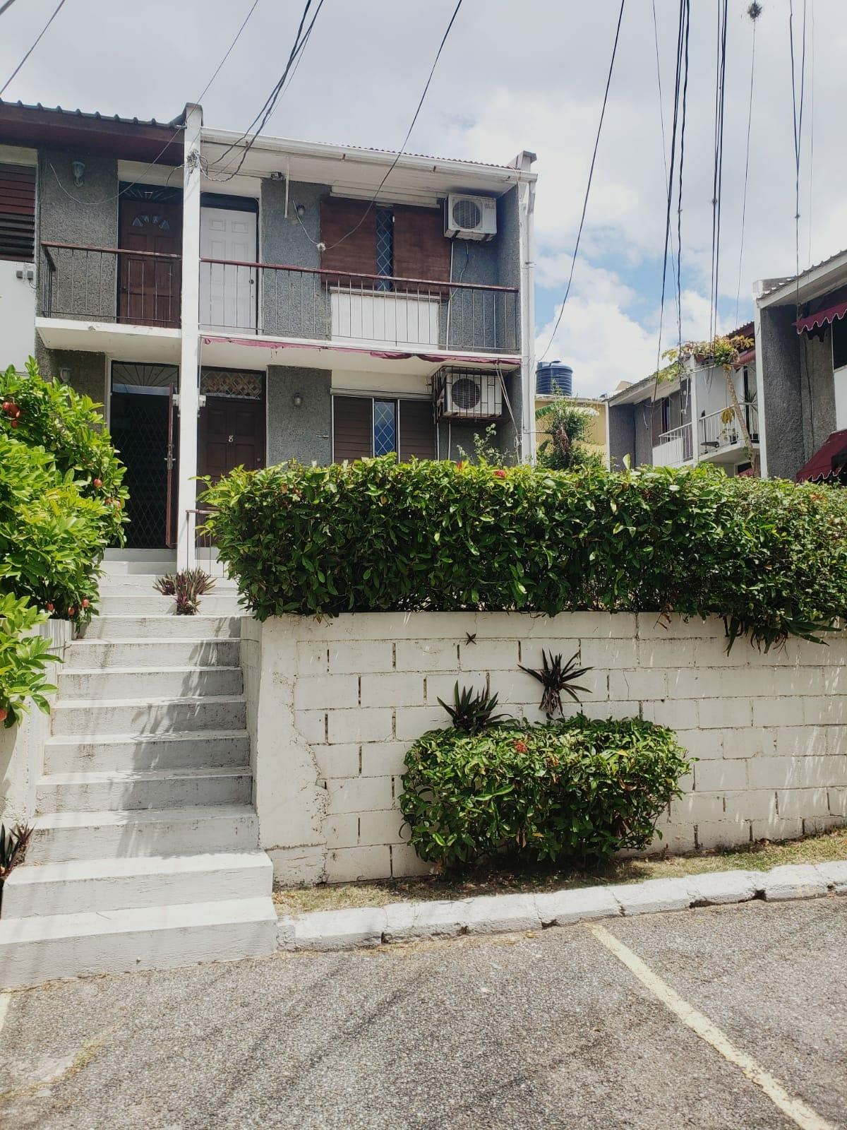 Fixer-Upper-Townhouse-for-Sale-in-St.-Andrew-Jamaica-–-Great-Investment-Opportunity Second image of 8- Ritchie Mews in Kingston 8, St. Andrew, Jamaica - property is For Sale