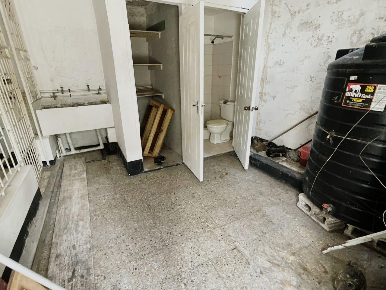 Fixer-Upper-Townhouse-for-Sale-in-St.-Andrew-Jamaica-–-Great-Investment-Opportunity Fourteenth image of 8- Ritchie Mews in Kingston 8, St. Andrew, Jamaica - property is For Sale