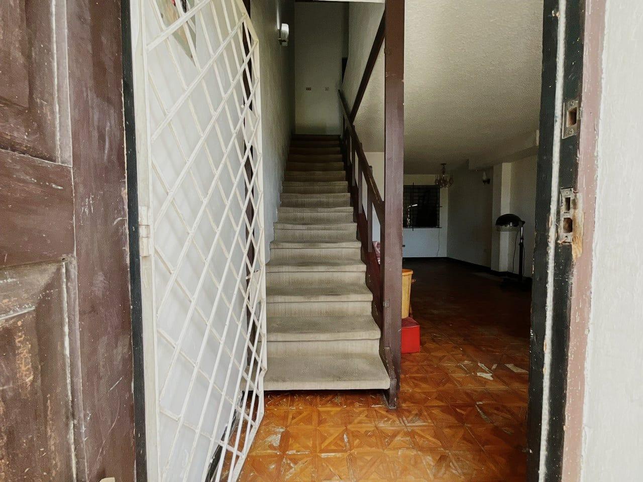 Fixer-Upper-Townhouse-for-Sale-in-St.-Andrew-Jamaica-–-Great-Investment-Opportunity Eighth image of 8- Ritchie Mews in Kingston 8, St. Andrew, Jamaica - property is For Sale