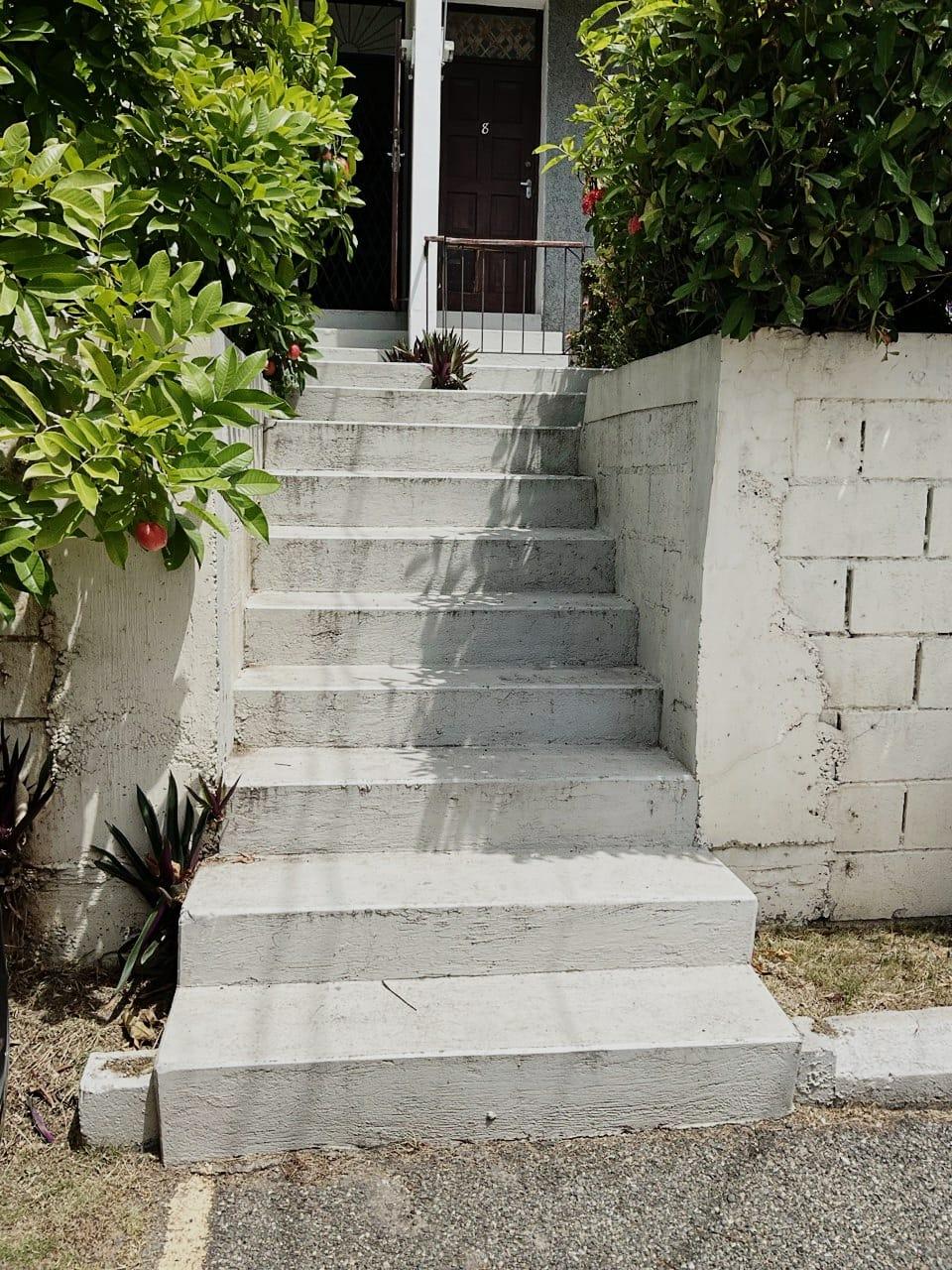 Fixer-Upper-Townhouse-for-Sale-in-St.-Andrew-Jamaica-–-Great-Investment-Opportunity First image of 8- Ritchie Mews in Kingston 8, St. Andrew, Jamaica - property is For Sale