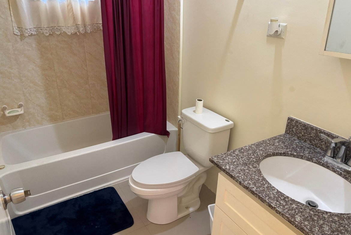 Twenty-Third image of 72 Flamingo Avenue in Drax Hall Estate, St. Ann, Jamaica - property is For Rent