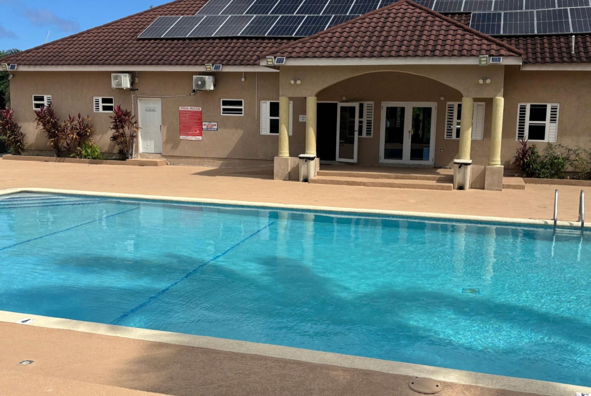 Sixth image of 72 Flamingo Avenue in Drax Hall Estate, St. Ann, Jamaica - property is For Rent