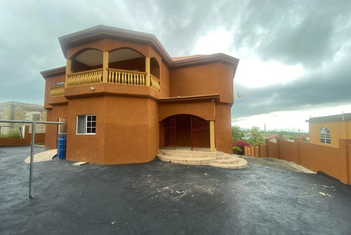 Fifth image of Kolanut Crescent Spur in Spur Tree, Manchester, Jamaica - property is For Sale