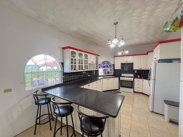 Fourth image of 9 Mckinley Avenue in Brumalia, Manchester, Jamaica - property is For Sale
