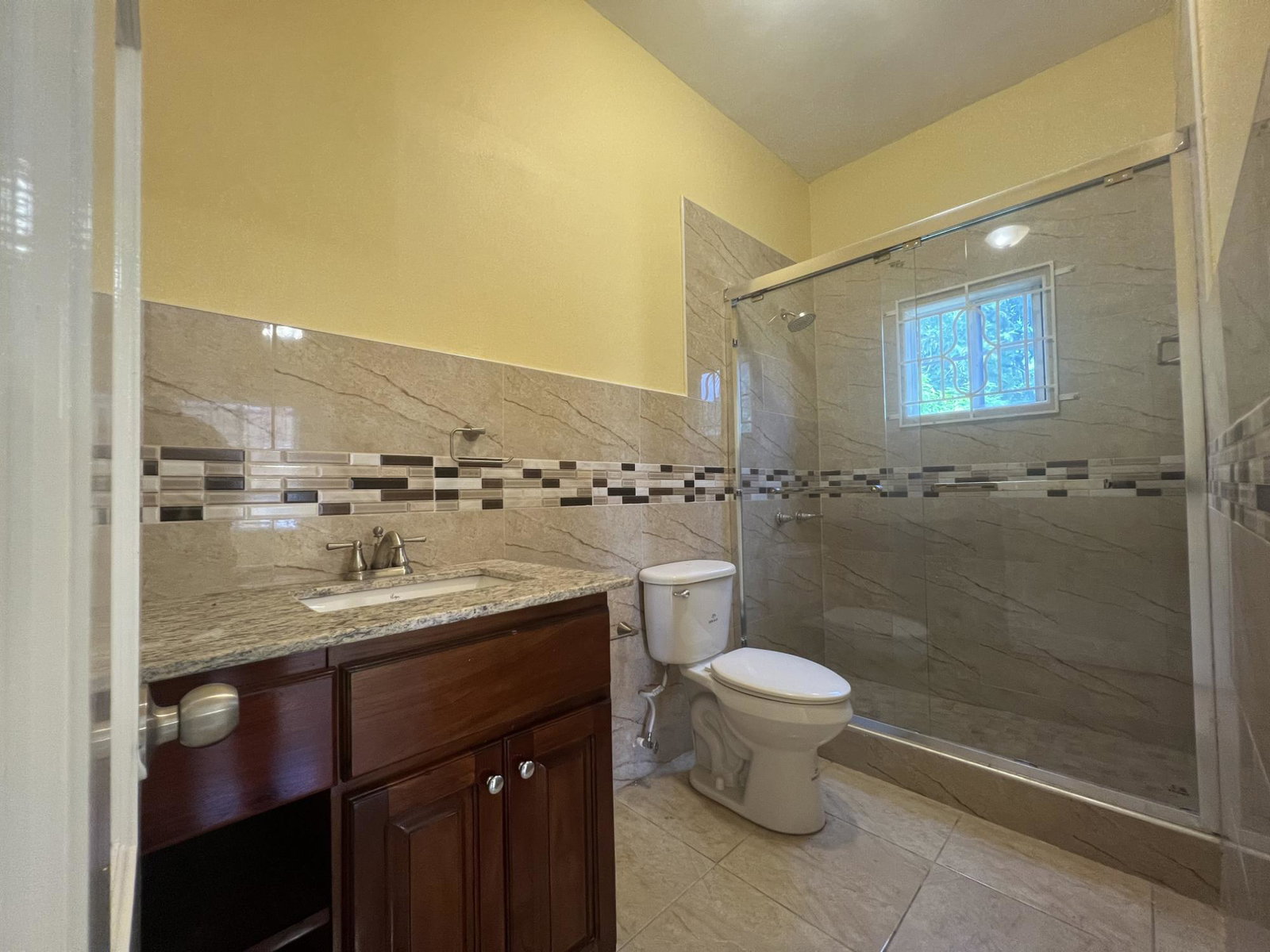 Modern-2-Bedroom-Apartment-for-Rent-in-Tower-Isles-St.-Mary-Jamaica Thirteenth image of 2-117 Reids Blvd, Tower Isles in Tower Isle, St. Mary, Jamaica - property is For Rent