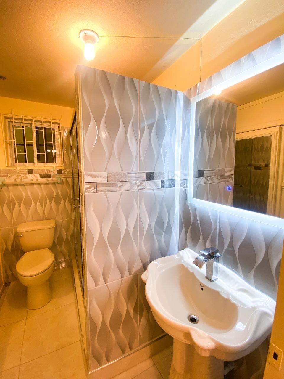 Nineteenth image of 357 Jacaranda Close , Walkway in Braeton Ph 2, St. Catherine, Jamaica - property is For Rent