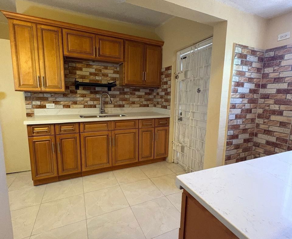 Eighth image of 357 Jacaranda Close , Walkway in Braeton Ph 2, St. Catherine, Jamaica - property is For Rent