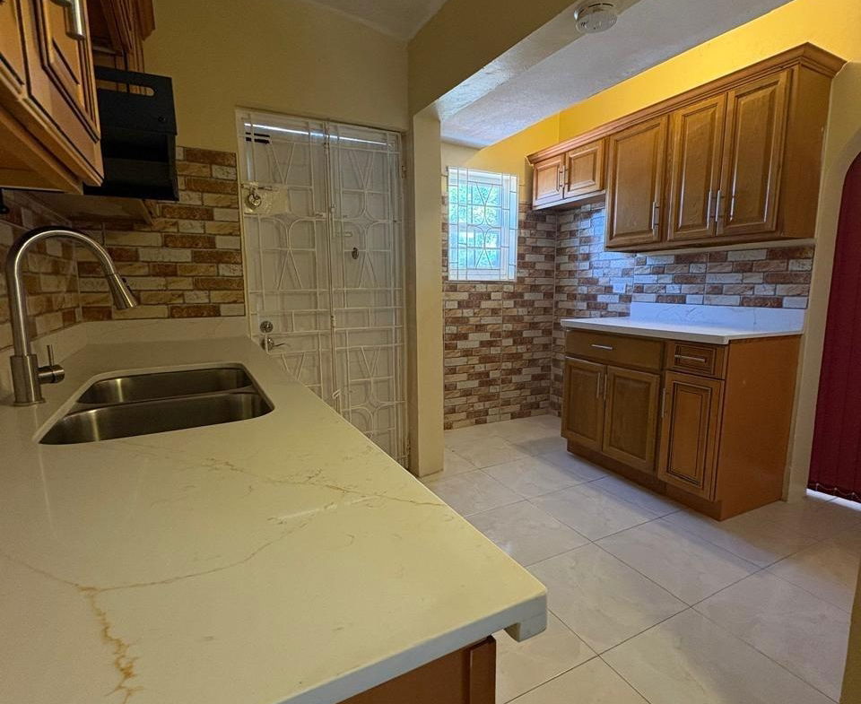 Ninth image of 357 Jacaranda Close , Walkway in Braeton Ph 2, St. Catherine, Jamaica - property is For Rent