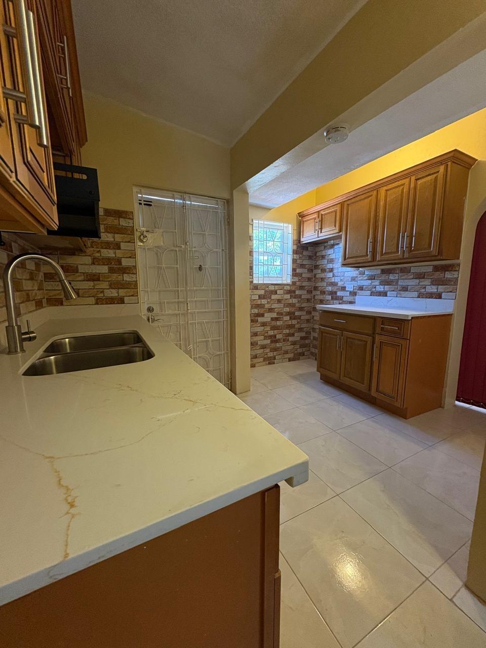 Ninth image of 357 Jacaranda Close , Walkway in Braeton Ph 2, St. Catherine, Jamaica - property is For Rent