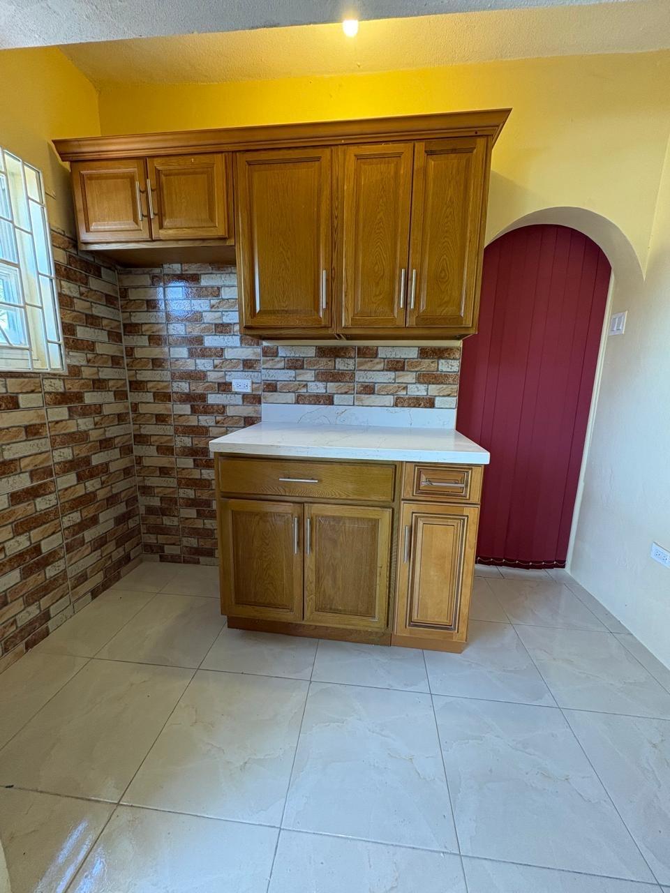 Tenth image of 357 Jacaranda Close , Walkway in Braeton Ph 2, St. Catherine, Jamaica - property is For Rent