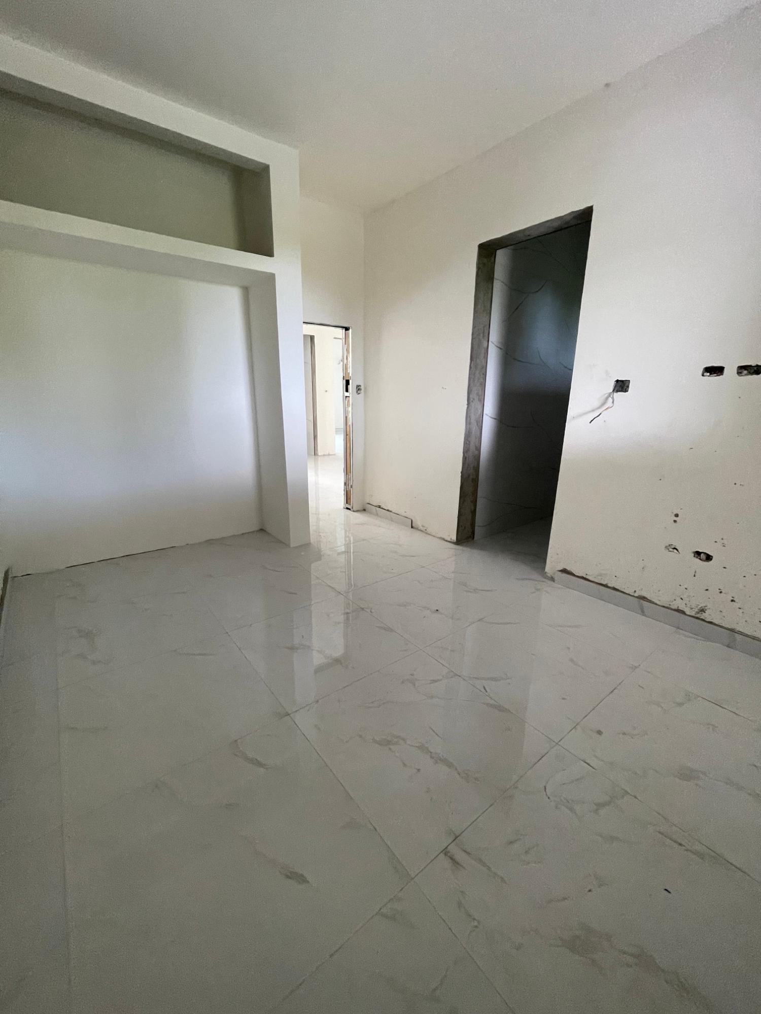 Modern-Apartment-for-Sale-in-St.-Andrew-Jamaica-–-Mountain-Views-Prime-Location Thirteenth image of 7-29 Border Avenue in Kingston 19, St. Andrew, Jamaica - property is For Sale