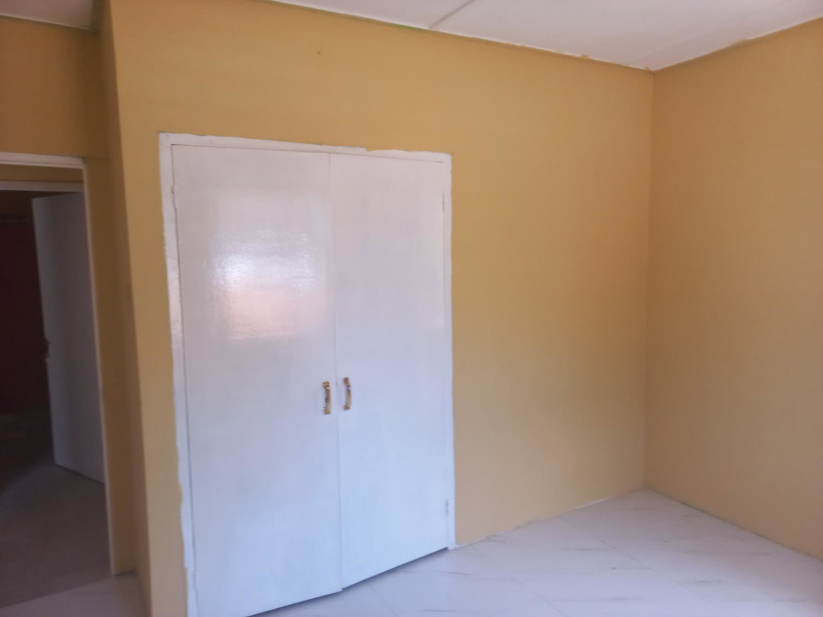 Spacious-2-Bedroom-Flat-for-Rent-in-St.-Catherine-Jamaica-2-48-Stuart-Avenue Seventh image of 2-48 Stuart Avenue in Spanish Town, St. Catherine, Jamaica - property is For Rent