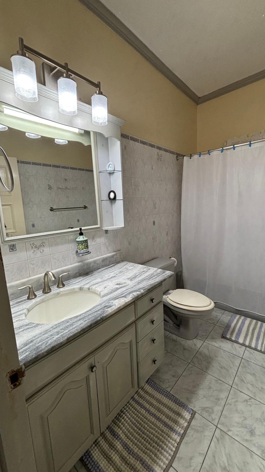 Twenty-First image of 95 Riviera Blvd. in Jamaica Beach, St. Mary, Jamaica - property is For Rent