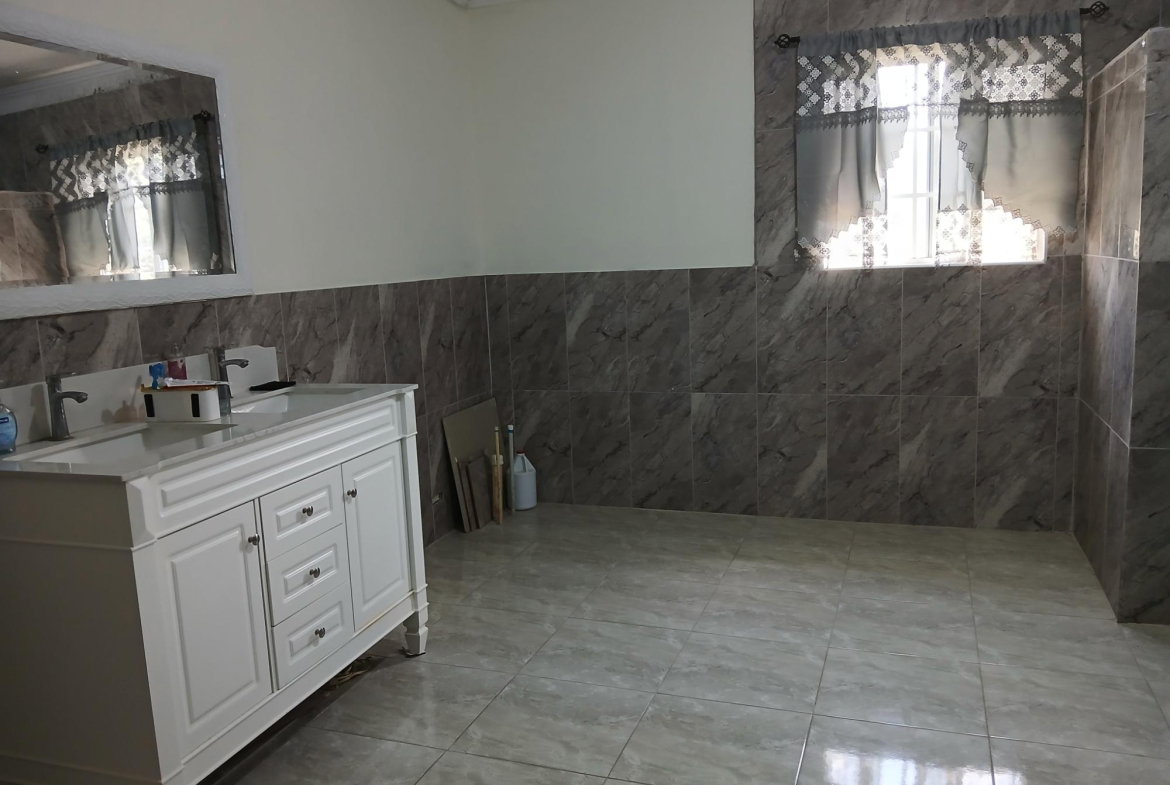 Twenty-First image of 97 Logwood Crescent in Ewarton, St. Catherine, Jamaica - property is For Sale