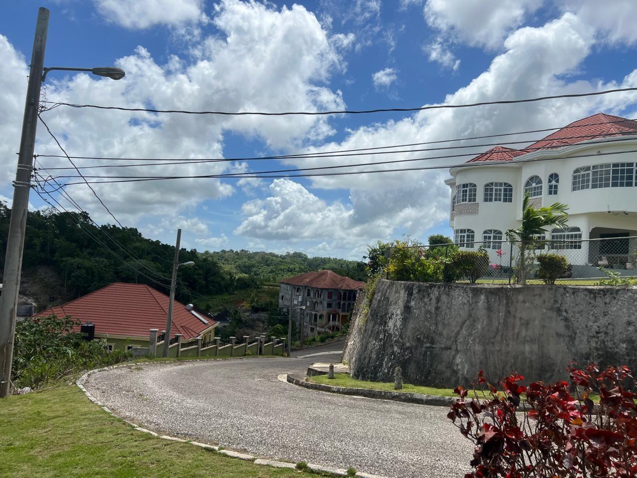 Stunning-14-Bedroom-House-for-Sale-in-Mandeville-Jamaica-Gated-Community-Income-Potential First image of 35 Hopeton Meadows, Mandevil in Mandeville, Manchester, Jamaica - property is For Sale