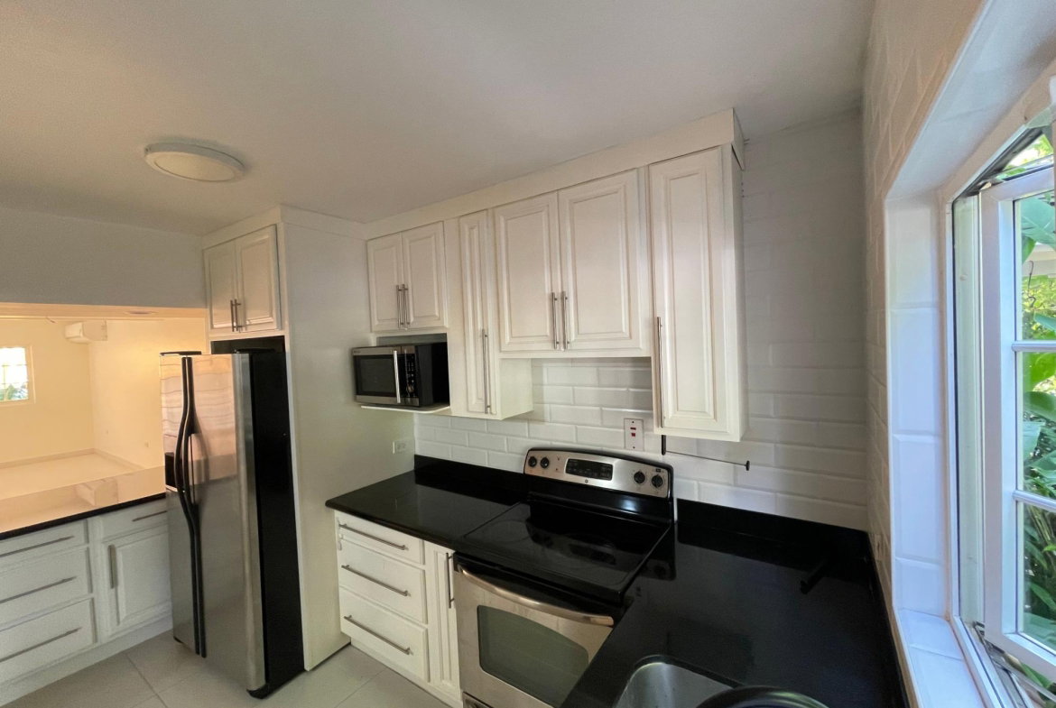 Seventh image of 22- Manor Court Mews in Kingston 8, St. Andrew, Jamaica - property is For Sale