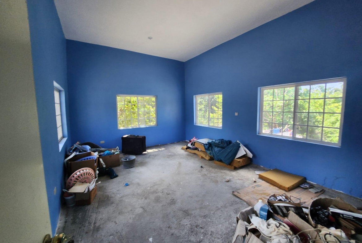 Thirteenth image of 126 Spring Farm Drive in Rose Hall, St. James, Jamaica - property is For Sale
