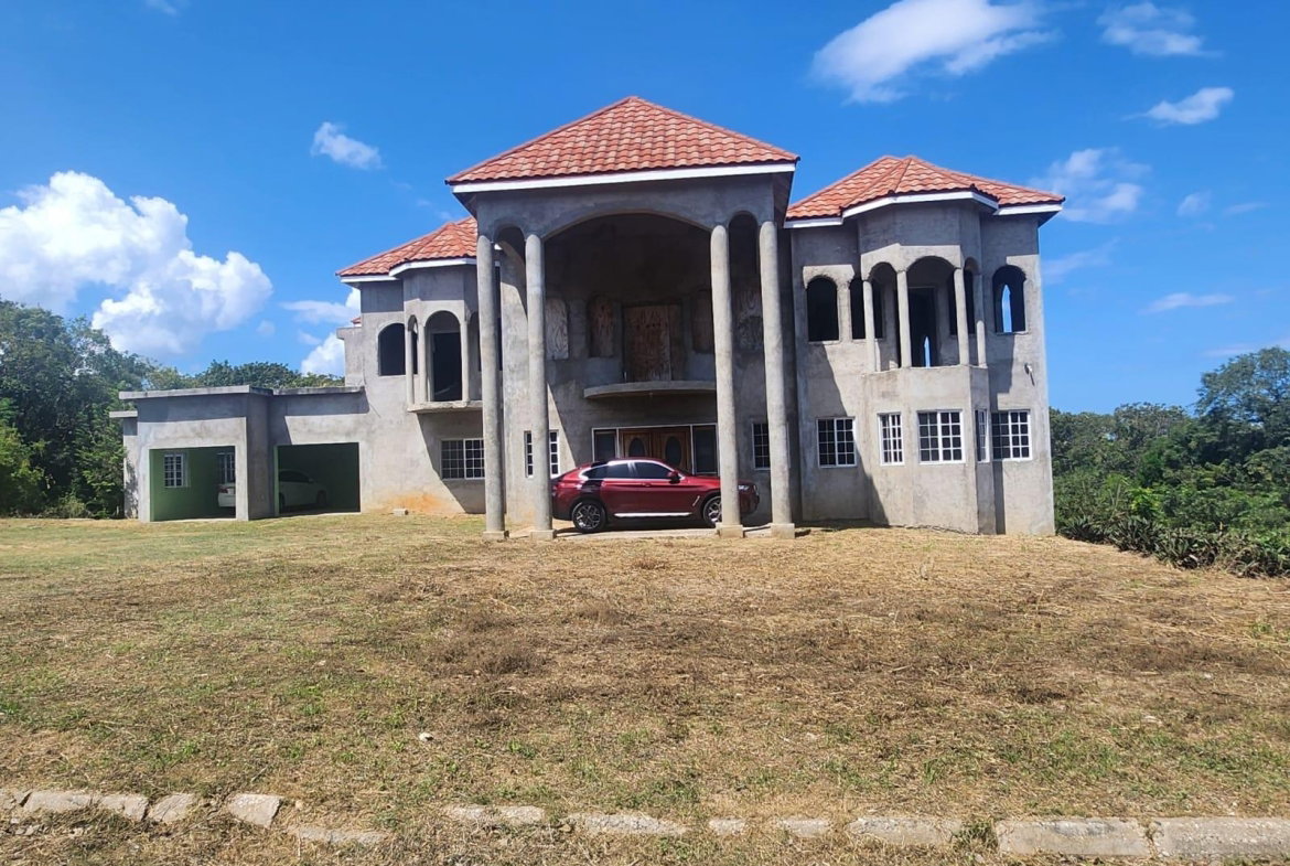 Third image of 126 Spring Farm Drive in Rose Hall, St. James, Jamaica - property is For Sale