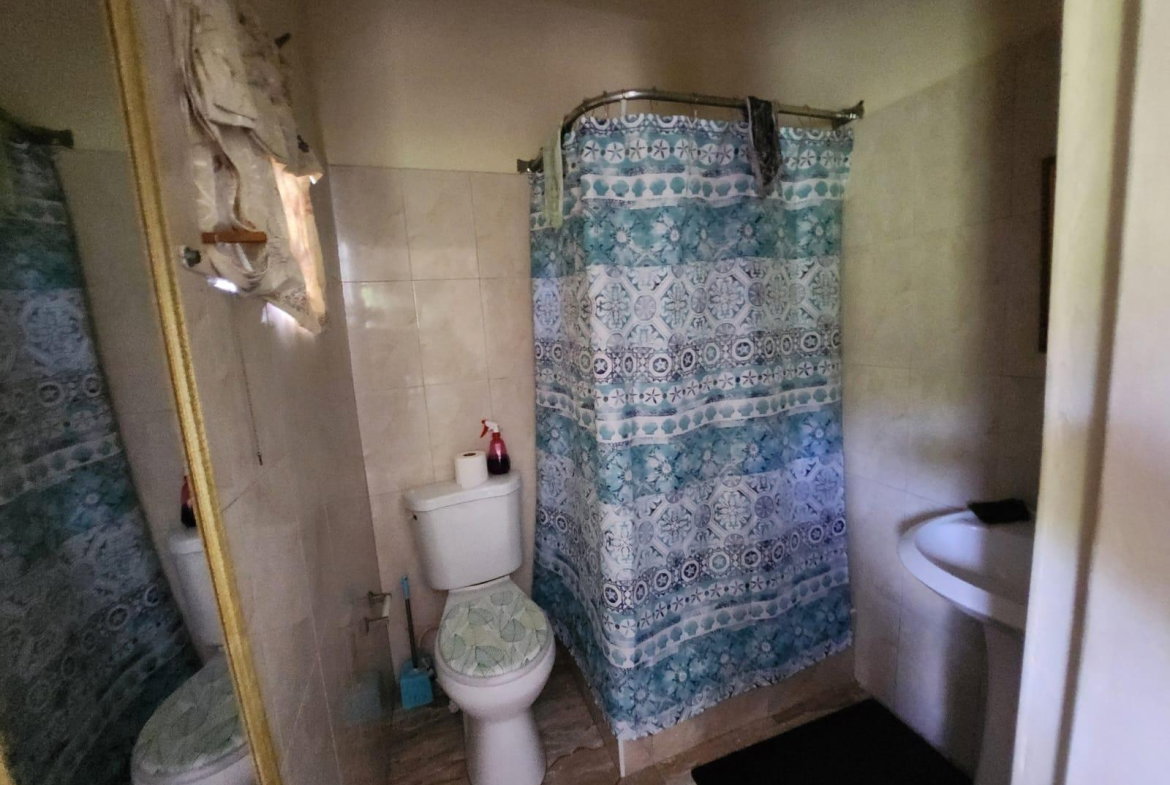 Ninth image of 126 Spring Farm Drive in Rose Hall, St. James, Jamaica - property is For Sale