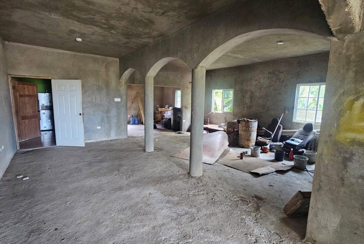 Fifth image of 216 Sandhill Circle in HELLSHIRE HILLS, St. Catherine, Jamaica - property is For Sale