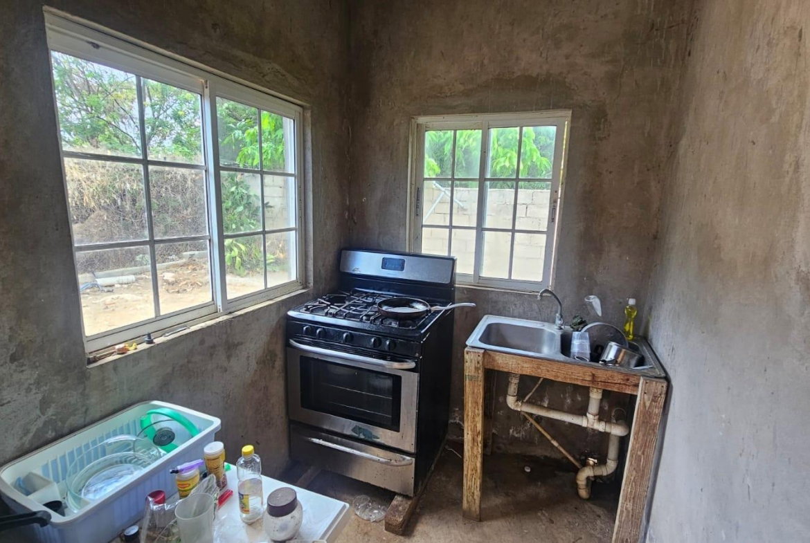 Eighth image of 216 Sandhill Circle in HELLSHIRE HILLS, St. Catherine, Jamaica - property is For Sale