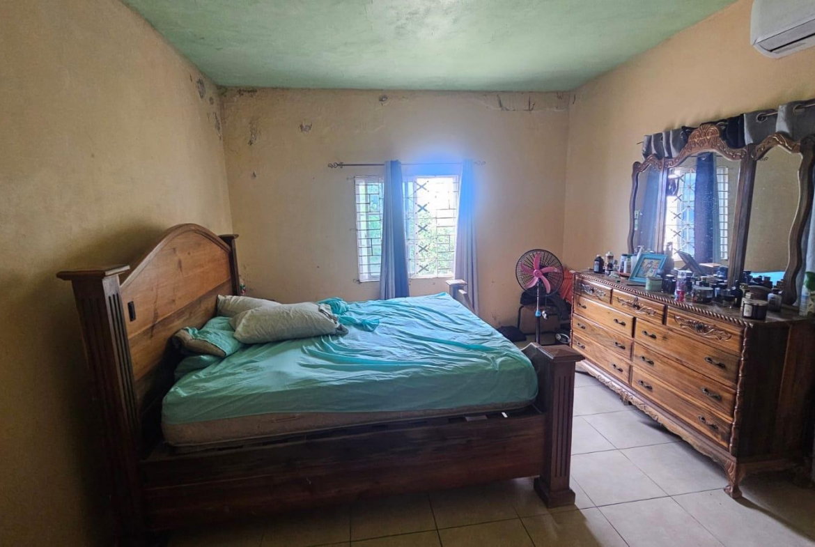 Ninth image of 216 Sandhill Circle in HELLSHIRE HILLS, St. Catherine, Jamaica - property is For Sale