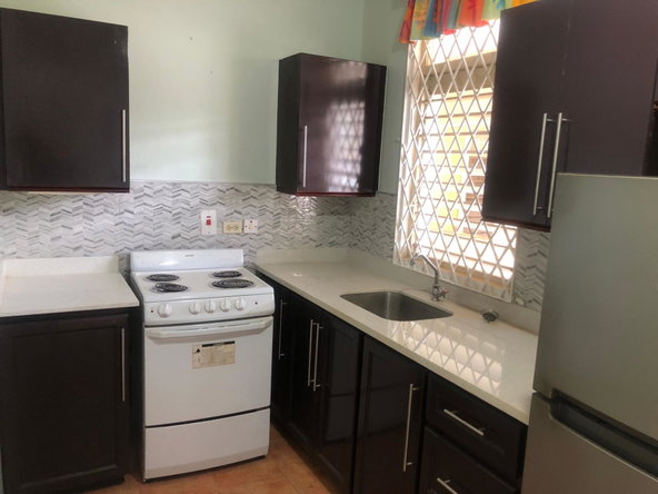 Third image of 12 Roehampton Drive in Kingston 19, St. Andrew, Jamaica - property is For Rent