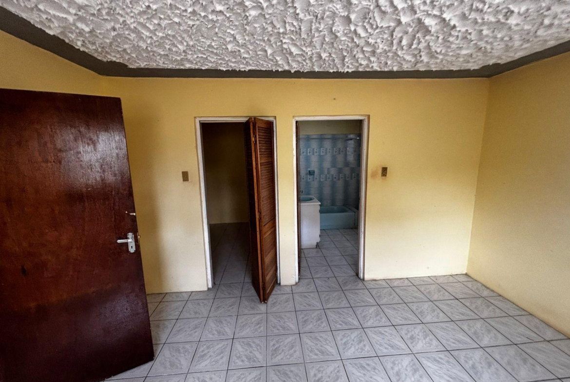 Twelfth image of Greenvale Road in Brumalia, Manchester, Jamaica - property is For Sale