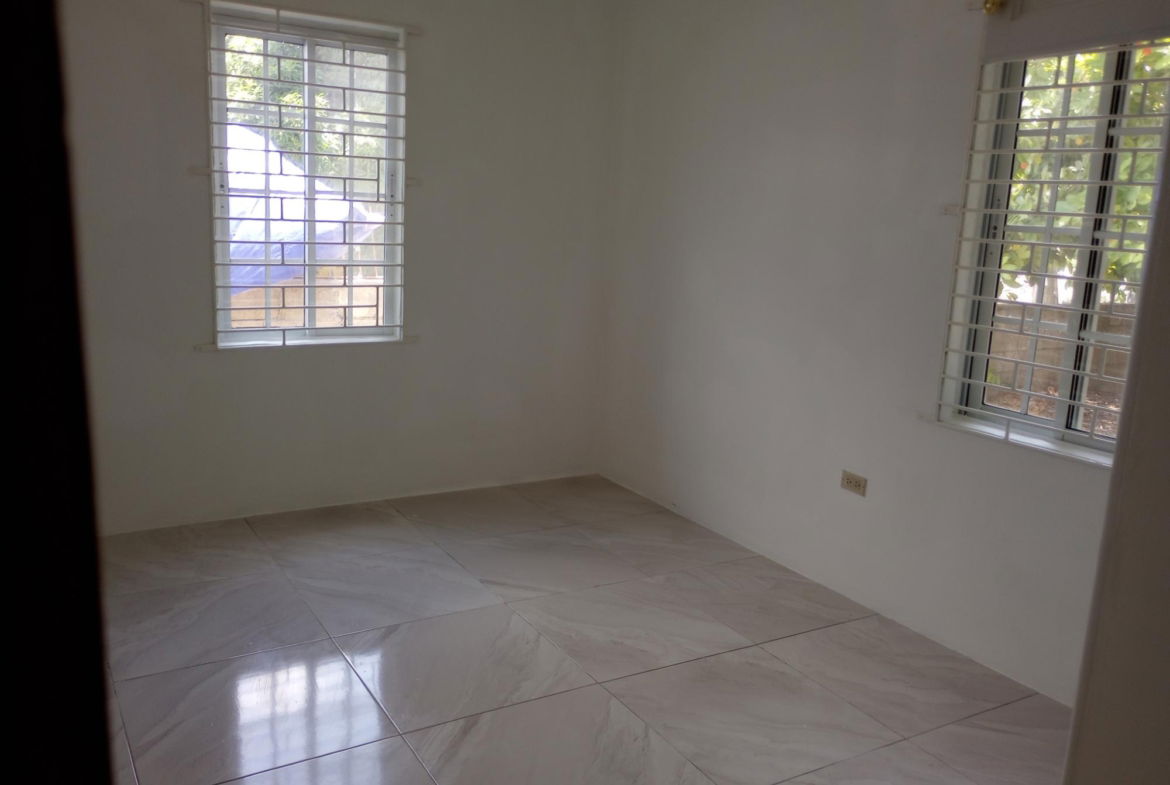 Seventh image of 32 Ensom Crescent, sp Town in Ensom City, St. Catherine, Jamaica - property is For Rent