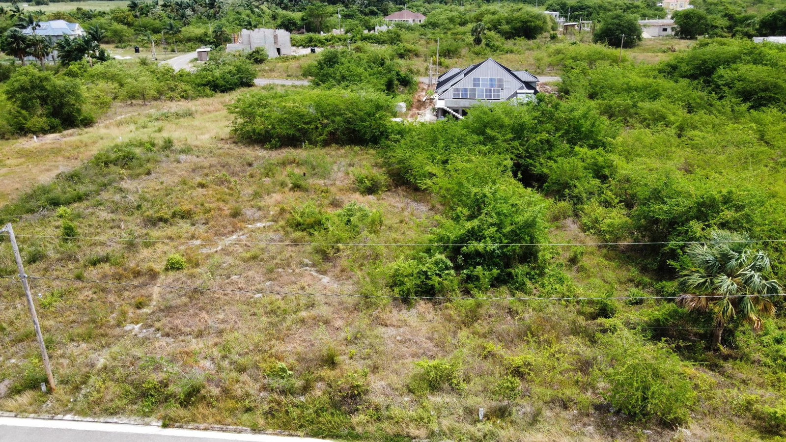 Residential-Lot-for-Sale-in-Palmbrook-Estate-St.-Elizabeth-Jamaica First image of 116 Palmbrook Estate in Lacovia, St. Elizabeth, Jamaica - property is For Sale
