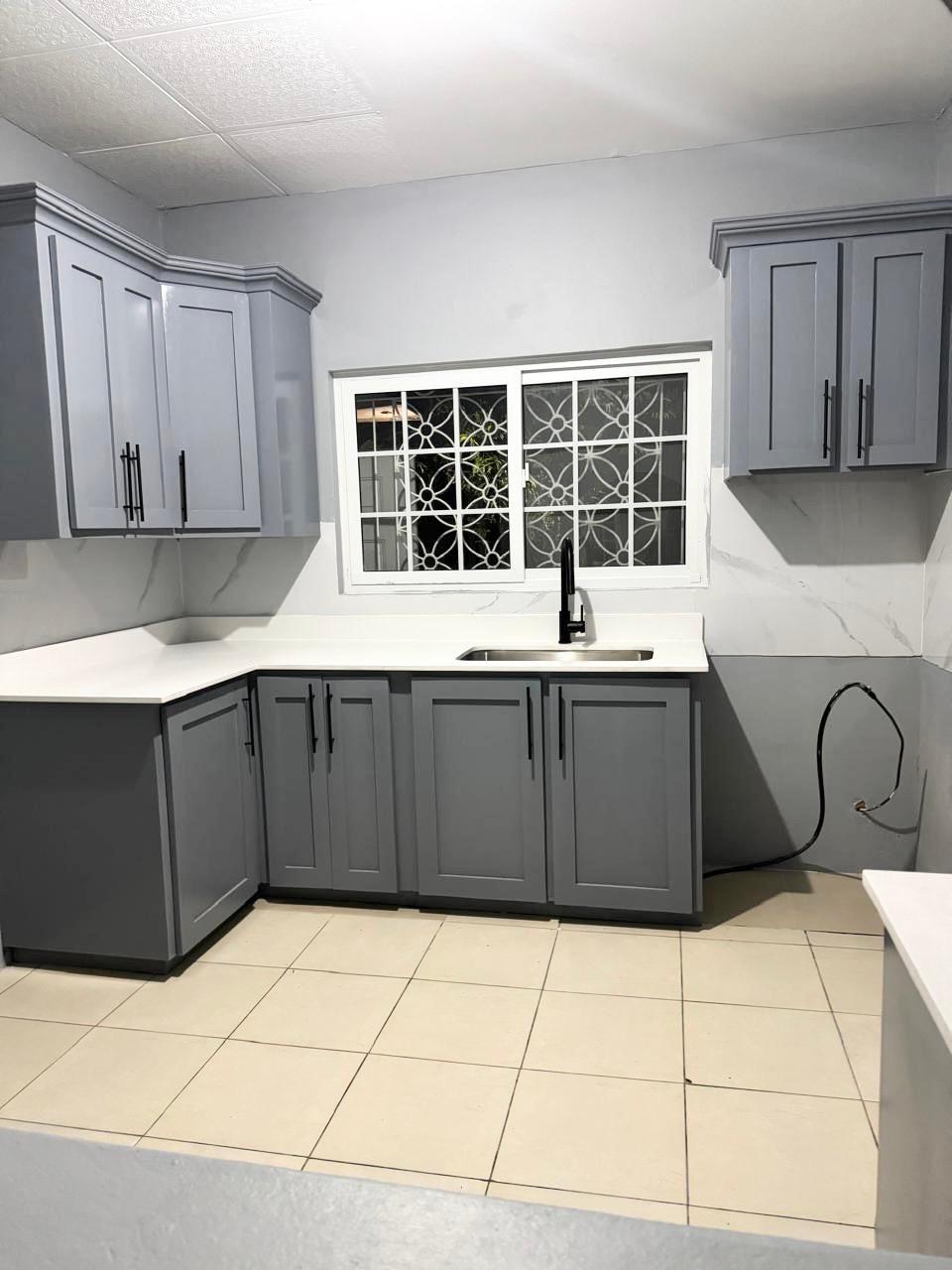 Fifth image of 18 Hurlingham Drive in Kingston 19, St. Andrew, Jamaica - property is For Rent
