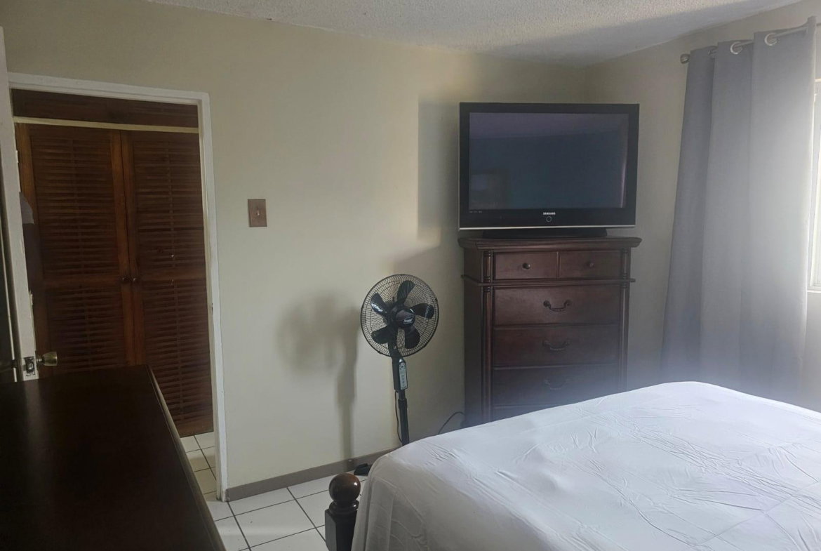 Eighth image of 504f-114 &1/2 Constant Spring Road in Kingston 8, St. Andrew, Jamaica - property is For Sale