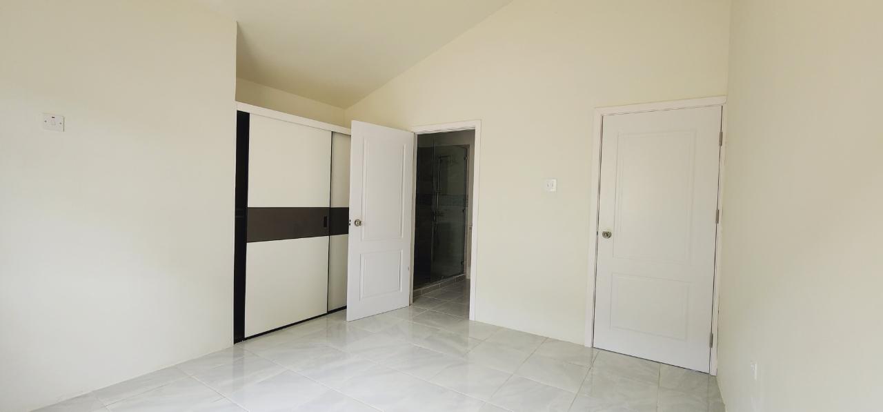 2-Bed-2-Bath-House-for-Rent-in-Camelot-Village-St.-Ann-Jamaica-Seaview-Secure-Spacious-Backyard Thirteenth image of 218 Camelot Village in Discovery Bay, St. Ann, Jamaica - property is For Rent