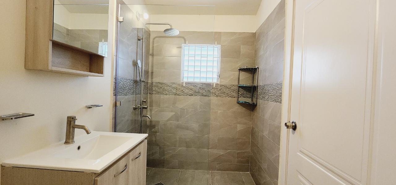 2-Bed-2-Bath-House-for-Rent-in-Camelot-Village-St.-Ann-Jamaica-Seaview-Secure-Spacious-Backyard Sixteenth image of 218 Camelot Village in Discovery Bay, St. Ann, Jamaica - property is For Rent