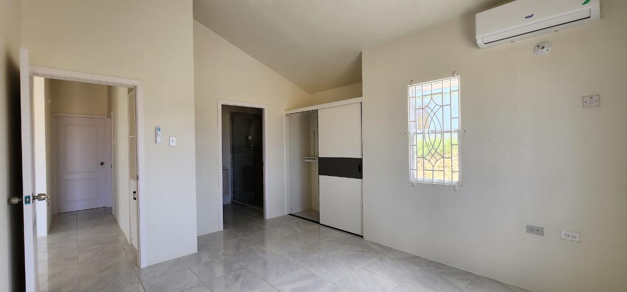 2-Bed-2-Bath-House-for-Rent-in-Camelot-Village-St.-Ann-Jamaica-Seaview-Secure-Spacious-Backyard Tenth image of 218 Camelot Village in Discovery Bay, St. Ann, Jamaica - property is For Rent