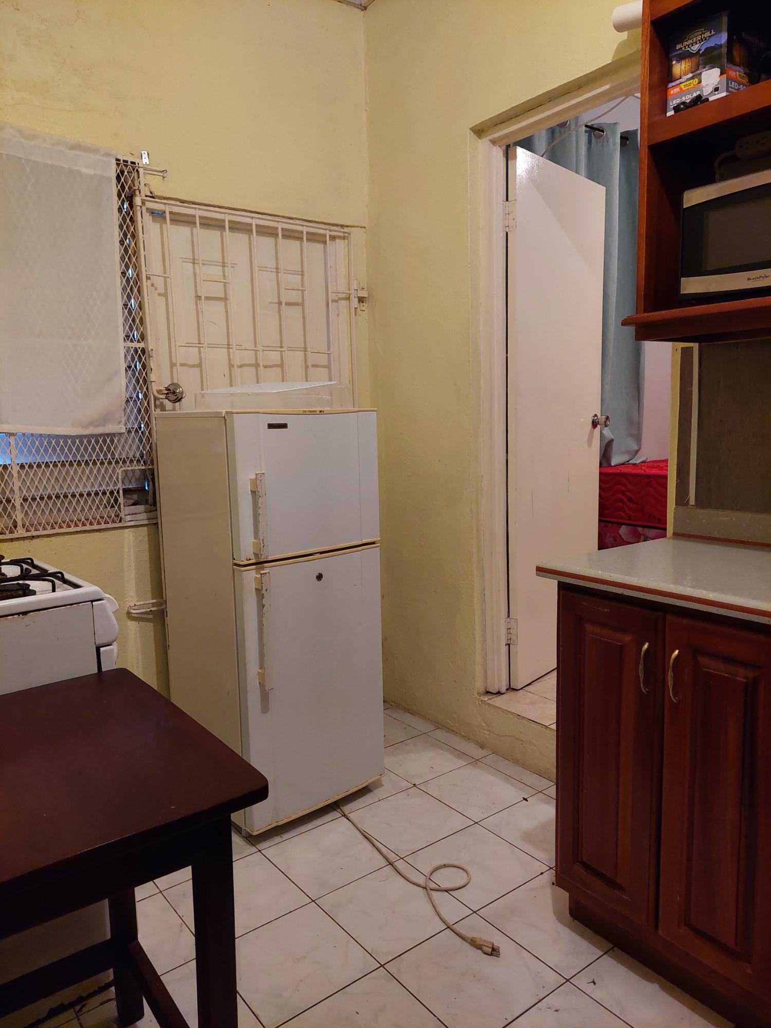 6-Bedroom-House-for-Sale-in-Mona-St.-Andrew-Jamaica-Investment-or-Family-Home Twelfth image of 4 Daisy Avenue, Mona in Kingston 6, St. Andrew, Jamaica - property is For Sale