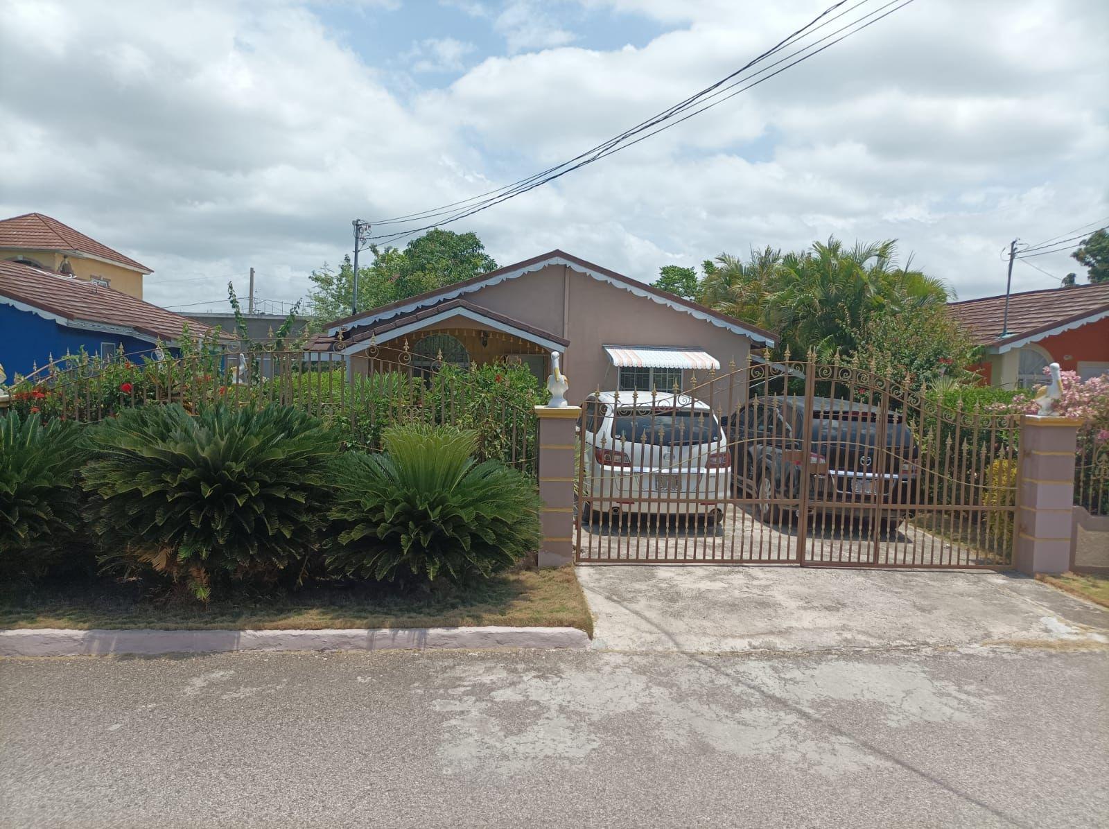 Charming-2-Bedroom-House-for-Sale-in-New-Harbour-Village-1-St.-Catherine-Jamaica First image of 798 New Harbour Village 1 in Old Harbour, St. Catherine, Jamaica - property is For Sale