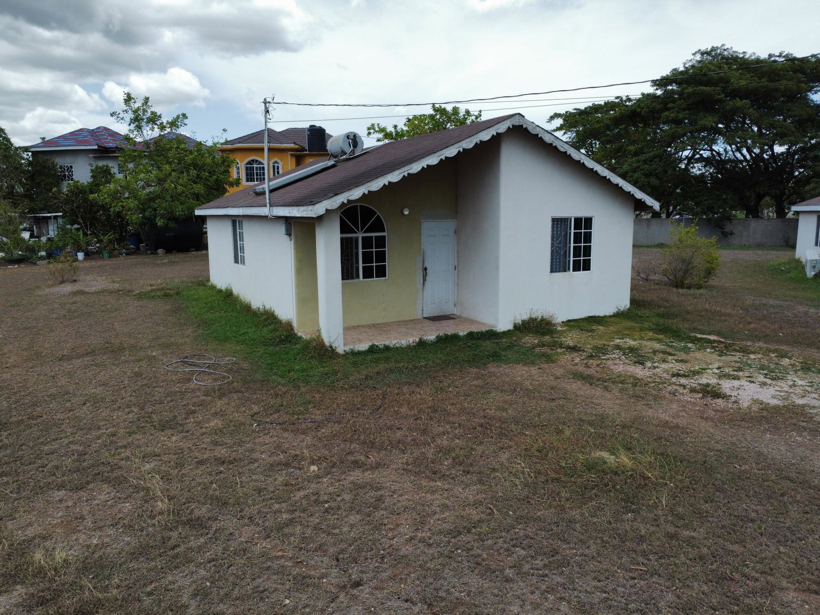 Charming-2-Bedroom-House-for-Sale-in-New-Harbour-Village-2-Old-Harbour-St.-Catherine First image of 488 Almond Place in New Harbour Village, St. Catherine, Jamaica - property is For Sale