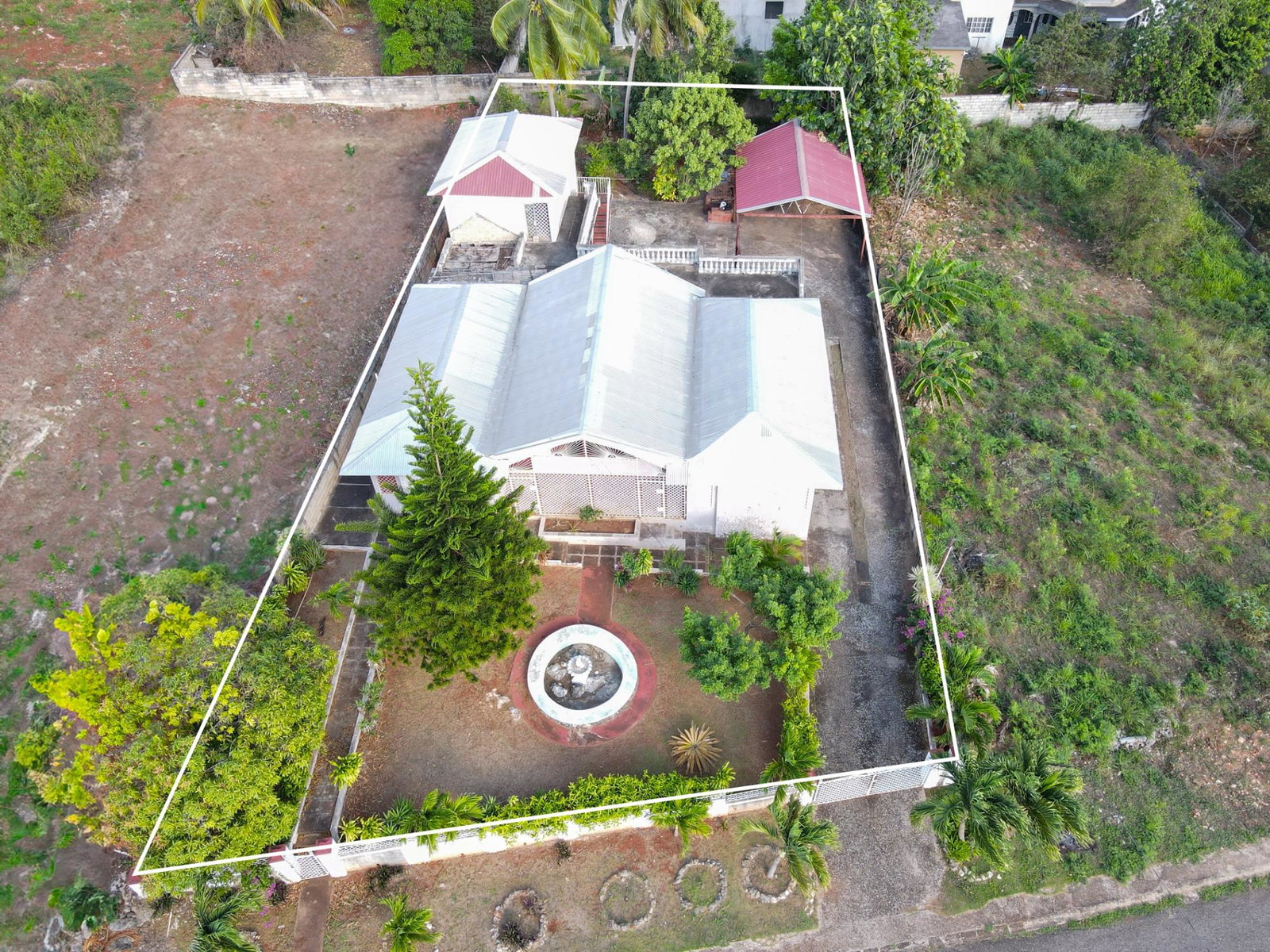 Fixer-Upper-House-for-Sale-in-Green-Acres-St.-Catherine-Jamaica-Investment-Opportunity First image of Century Boulevard in Green Acres, St. Catherine, Jamaica - property is For Sale