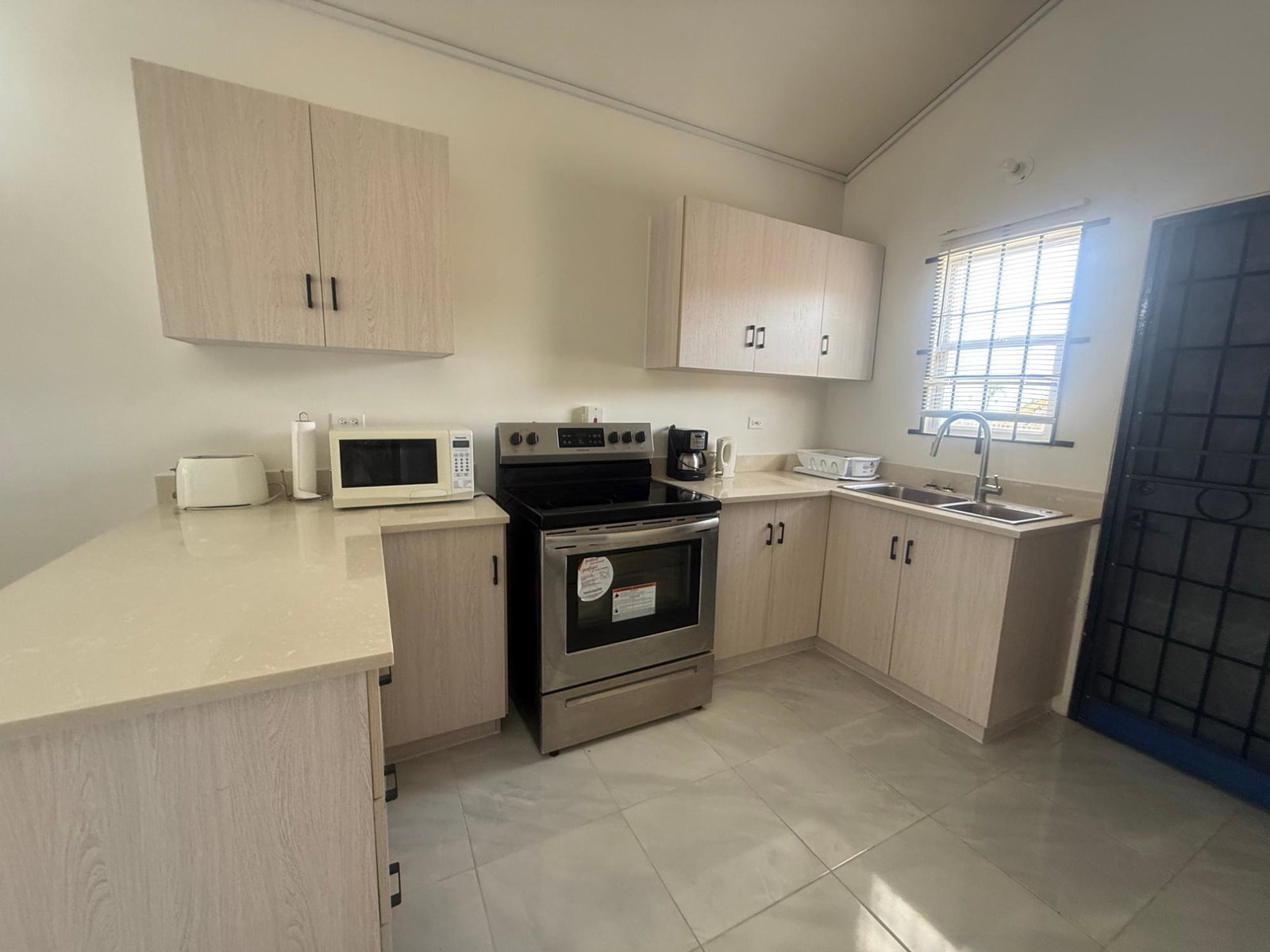 Furnished-2-Bedroom-Home-for-Rent-in-Camelot-Village-Discovery-Bay-St.-Ann Sixth image of Camelot Village in Discovery Bay, St. Ann, Jamaica - property is For Rent