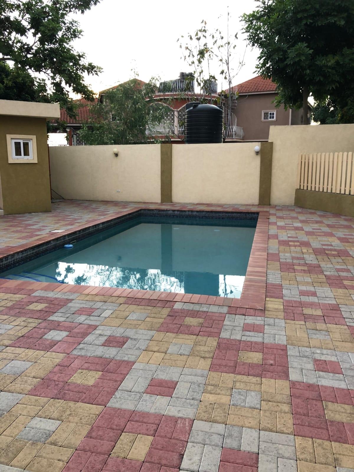 Ground-Floor-Apartment-for-Sale-in-Kingston-6-–-2-Bed-2.5-Bath-Prime-Location Twenty-First image of 11-7 Charlemont Avenue in Kingston 6, St. Andrew, Jamaica - property is For Sale