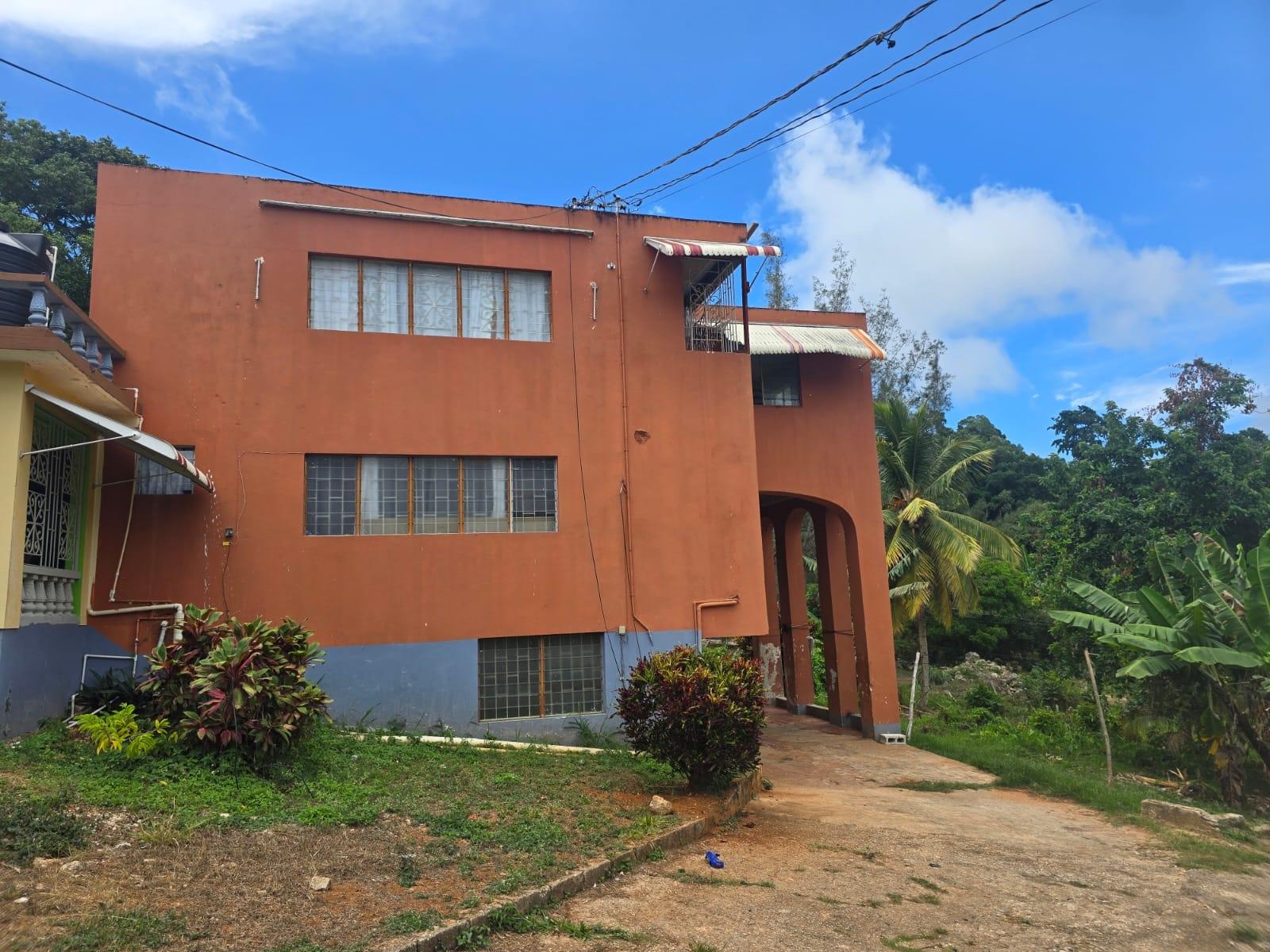 Income-Generating-Property-for-Sale-in-Browns-Town-St.-Ann-–-Two-Buildings-on-38115-sq.-ft First image of Lot 5 Ingleside in Browns Town, St. Ann, Jamaica - property is For Sale