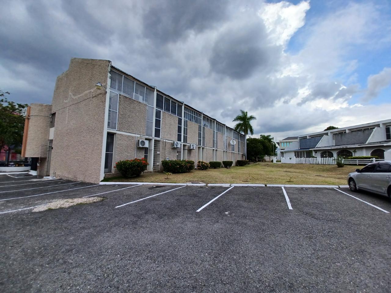 Modern-1BR-Split-Level-Apartment-for-Rent-in-St.-Andrew-Jamaica First image of 13-5 West Kings House Road in Kingston 10, St. Andrew, Jamaica - property is For Rent
