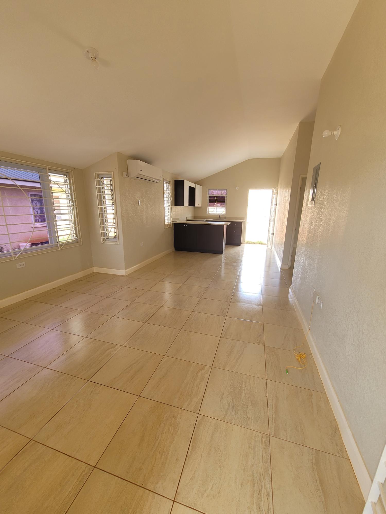 Modern-2-Bedroom-House-for-Rent-in-Silversun-Estate-St.-Catherine-Jamaica First image of 1065 Silversun Estate in Spanish Town, St. Catherine, Jamaica - property is For Rent