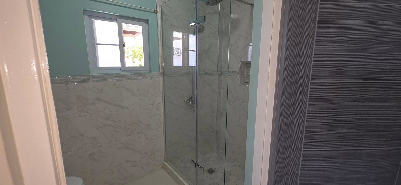 Modern-3-Bedroom-House-for-Rent-in-Queen-Hill-Kingston-St.-Andrew Twelfth image of 11 Cleopatra Avenue, Queen h in Kingston 19, St. Andrew, Jamaica - property is For Rent