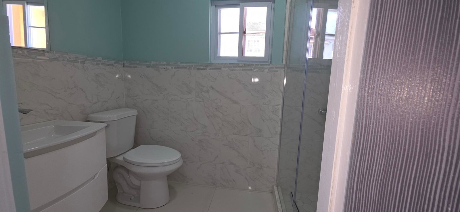 Modern-3-Bedroom-House-for-Rent-in-Queen-Hill-Kingston-St.-Andrew Sixteenth image of 11 Cleopatra Avenue, Queen h in Kingston 19, St. Andrew, Jamaica - property is For Rent
