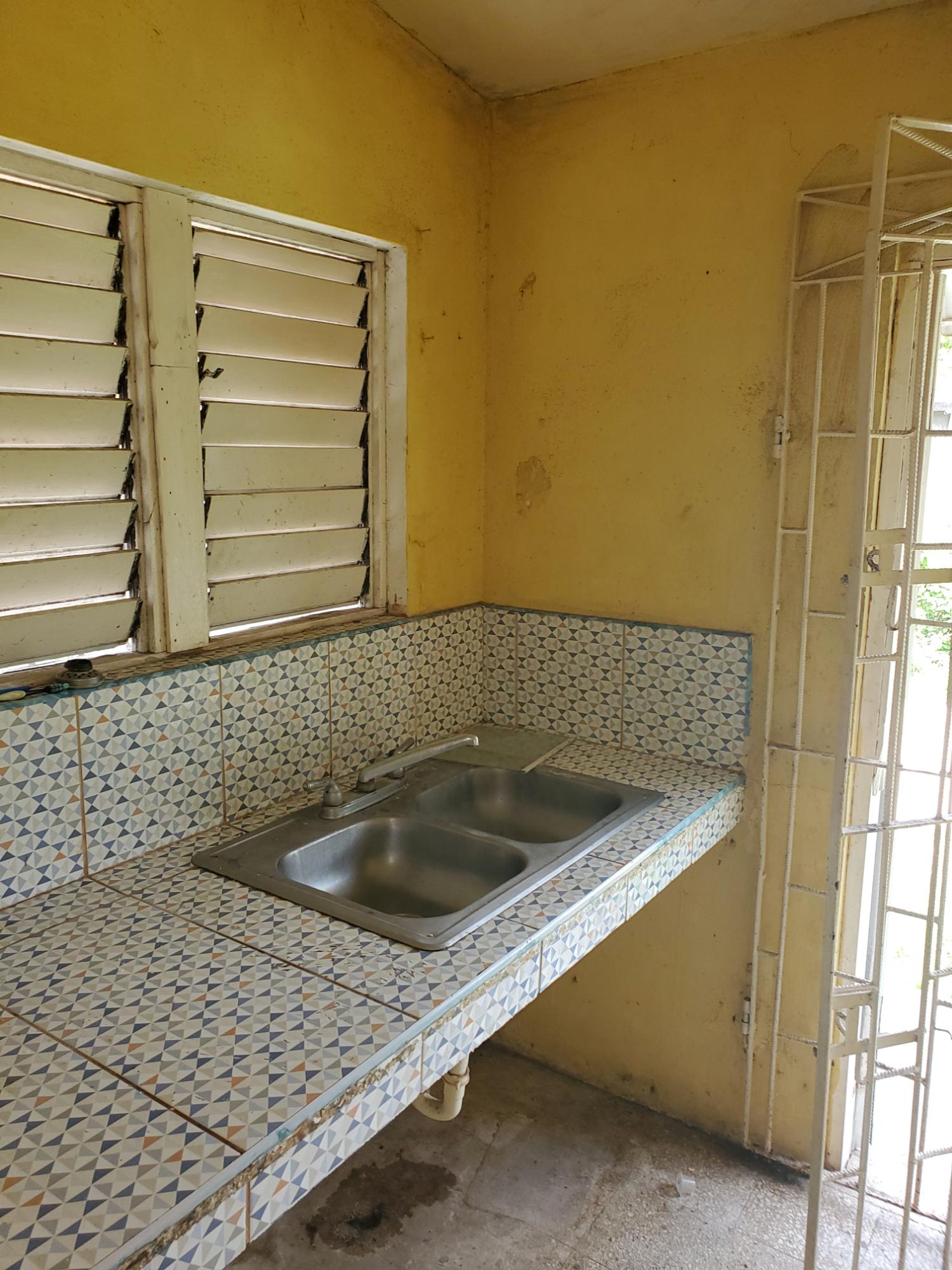 Multi-Family-Fixer-Upper-For-Sale-in-St.-James-Jamaica-–-Great-Investment-Opportunity Seventeenth image of 423 Pitfour Pen Granville St. in Paradise Heights, St. James, Jamaica - property is For Sale