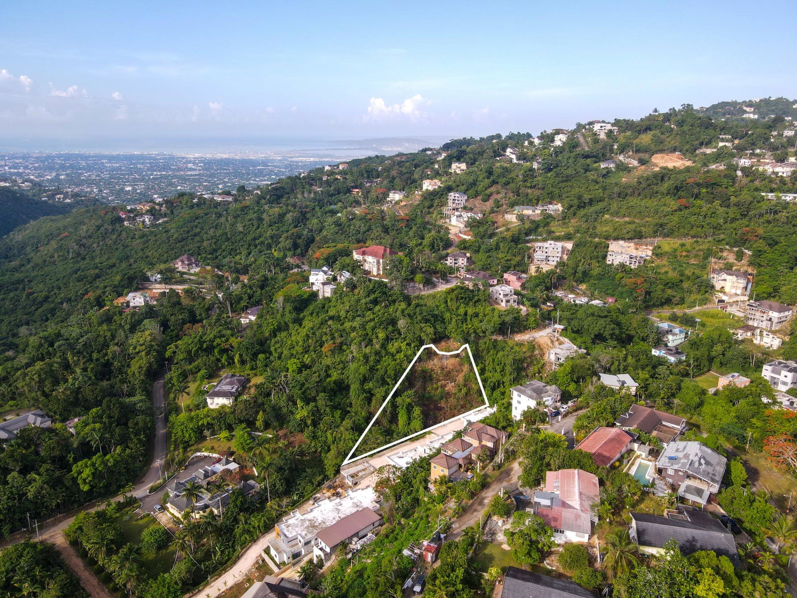 Residential-Lot-for-Sale-in-Stony-Hill-St.-Andrew-–-19921-Sq-Ft-7-Crystal-Way-Jamaica First image of 7 Crystal Way in Kingston 9, St. Andrew, Jamaica - property is For Sale