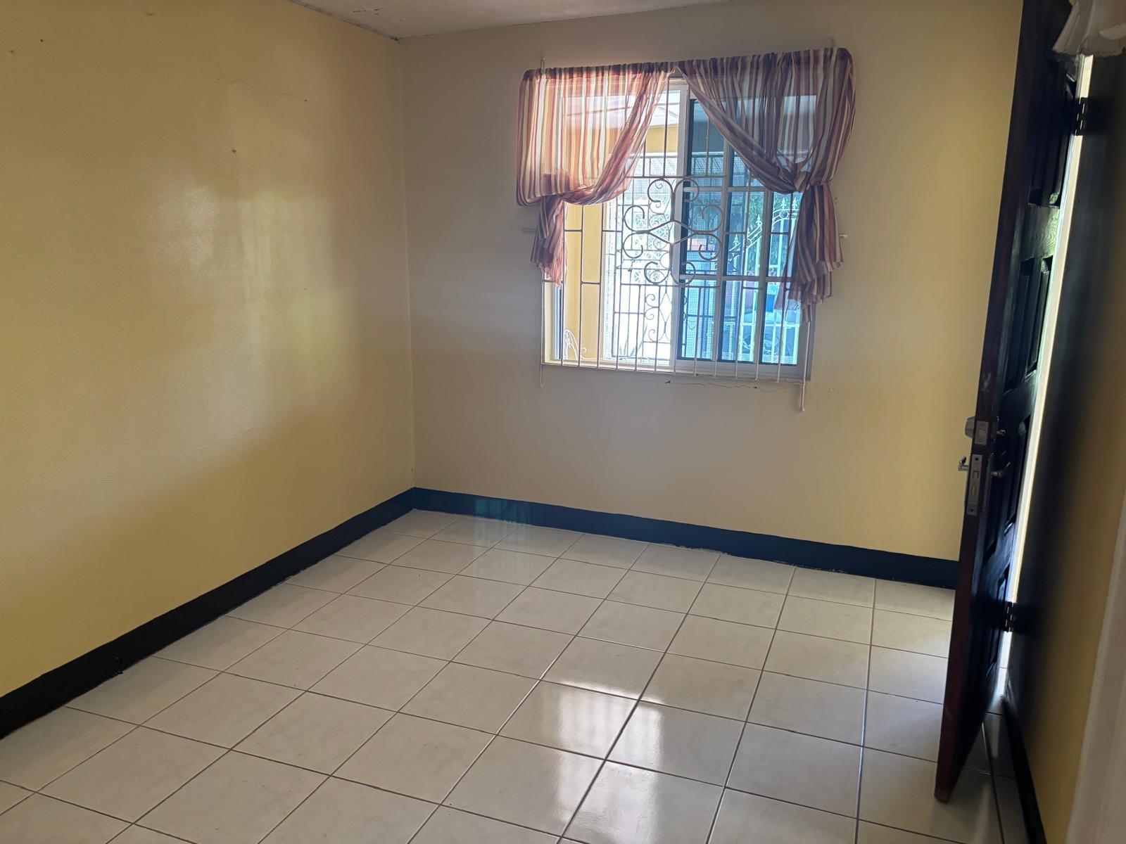 Spacious-4-Bedroom-House-for-Rent-in-Ensom-City-St.-Catherine-Jamaica Seventeenth image of 11 Barness Close, Ensom City in Ensom City, St. Catherine, Jamaica - property is For Rent